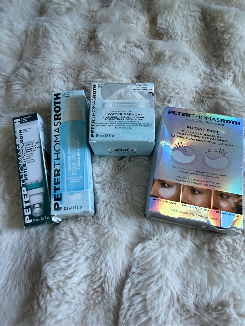 Peter Thomas Roth Skincare Set in Teal, White, Silver, and Holographic